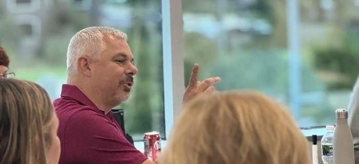 An AAIM roundtable member making a point during discussion