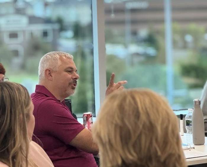 An AAIM roundtable member making a point during discussion