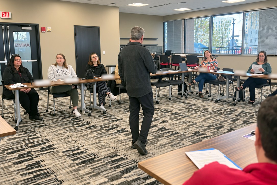 Professionals in a U-shape training session at AAIM's downtown Peoria training room